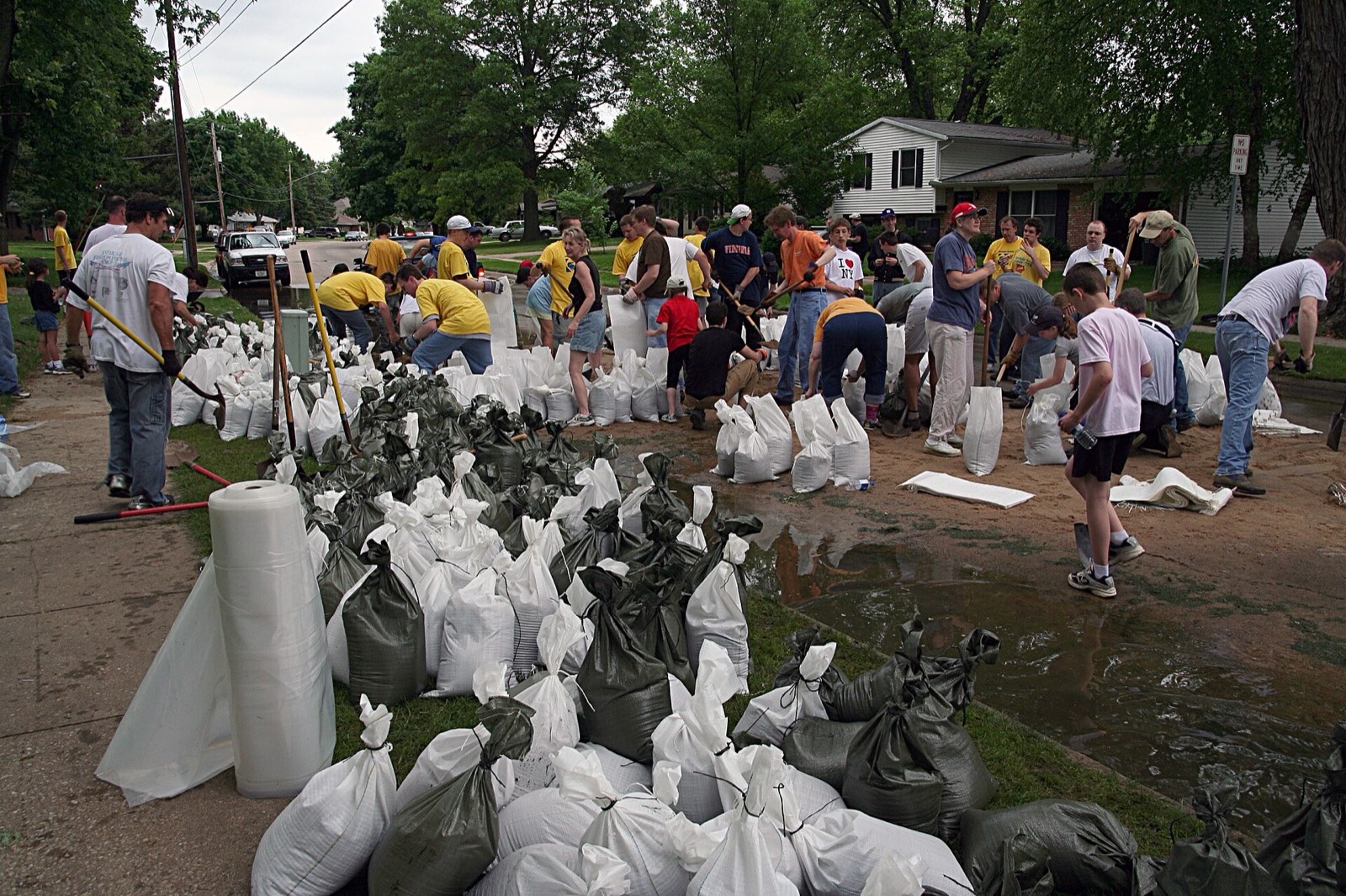 Volunteers filling sandbags ahead of a flood