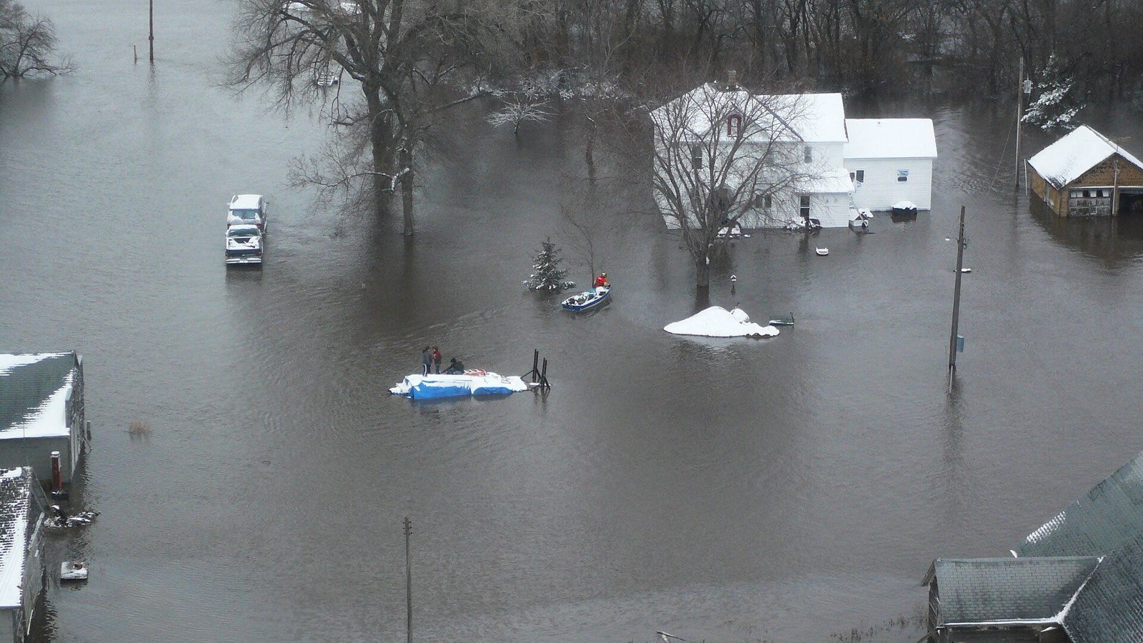 Floodwater surrounding homes in a small town